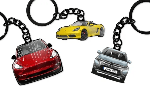Personalized car keychains featuring a red sedan, a yellow sports convertible, and a blue sedan, designed as custom car accessories and gifts