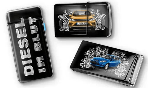 Three black car-themed lighters with metallic accents. One has 