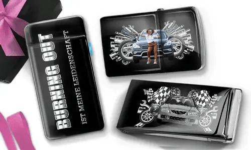 Three black wallets with car-themed designs. One has 