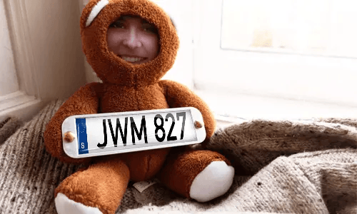 Cuddly toy with photo in the house