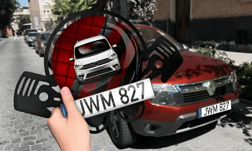 Autoschlüsselanhänger in der Hand mit dem Kennzeichen auto schlüsselanhänger gravur