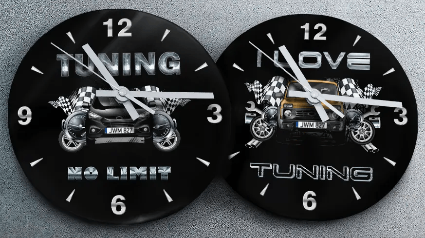 Two racing-themed wall clocks: left with black car and TUNING NO LIMIT text, right with blue car and MOVE TUNING text